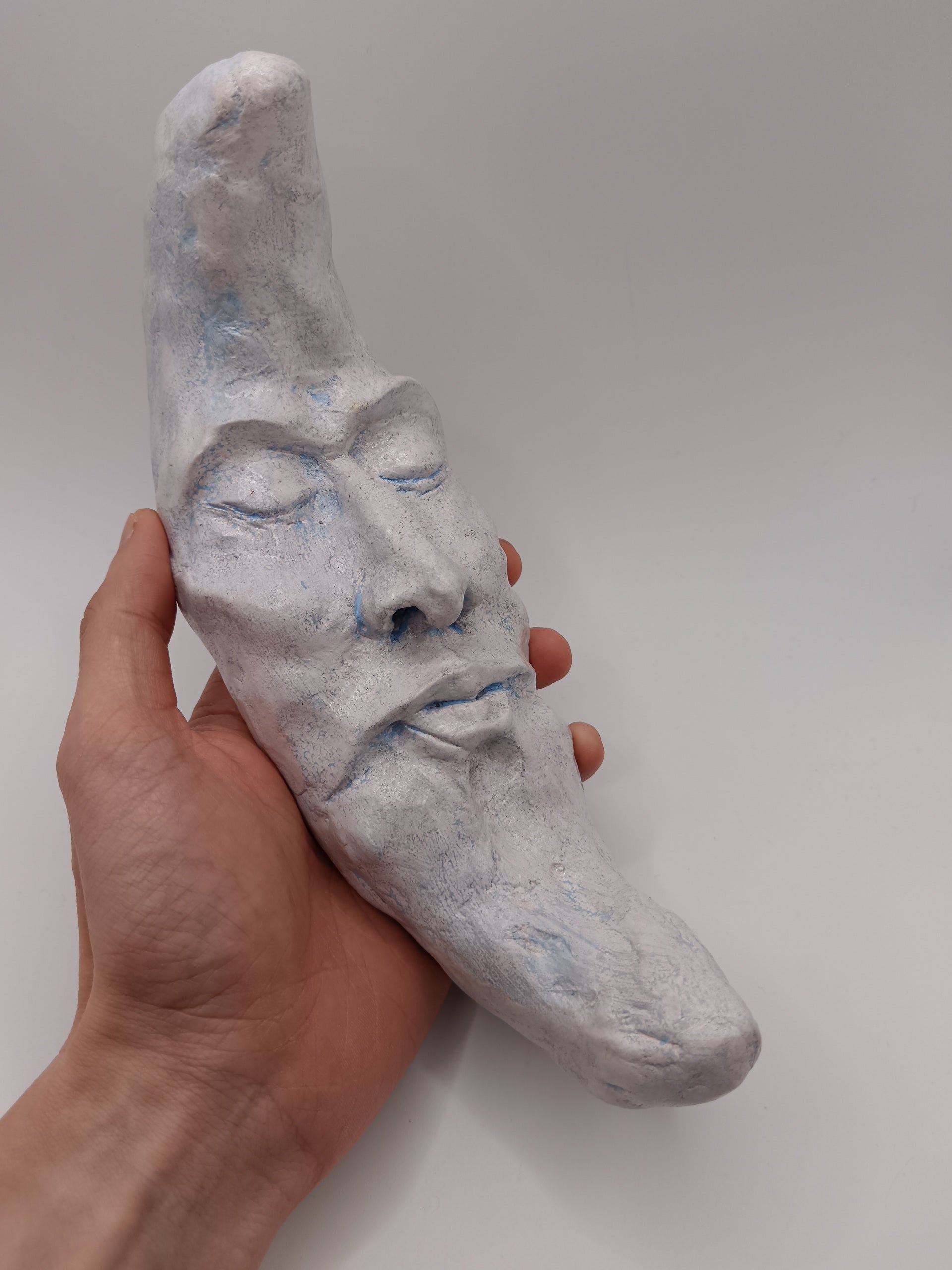 handmade sleeping moon sculpture