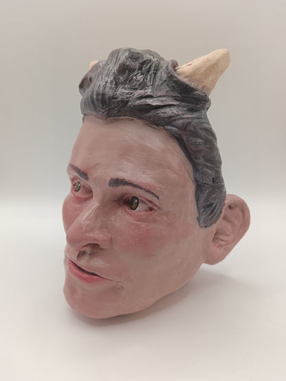 handmade devil boy vase, front left