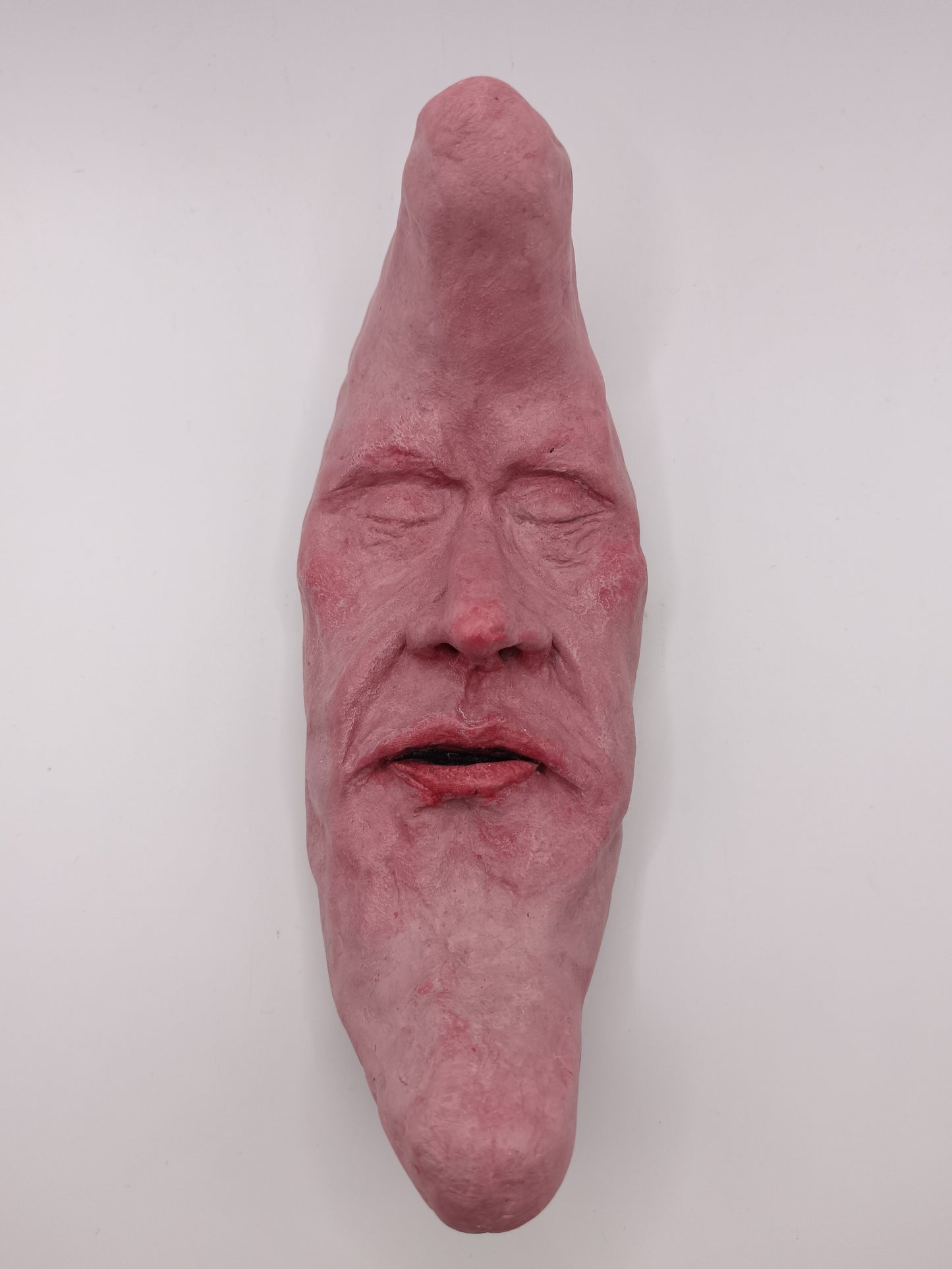 pink crescent moon clay sculpture 