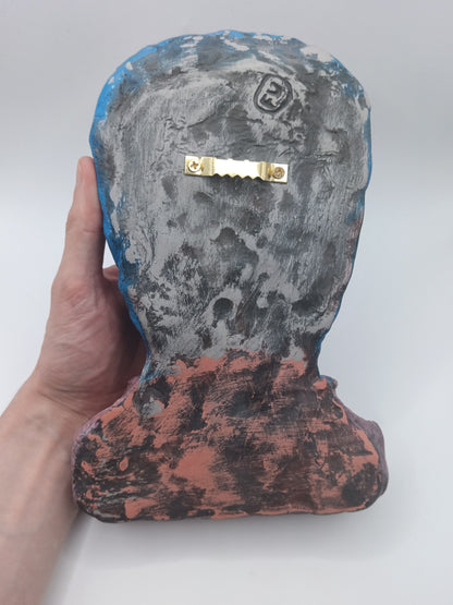 handmade clay alien sculpture, back