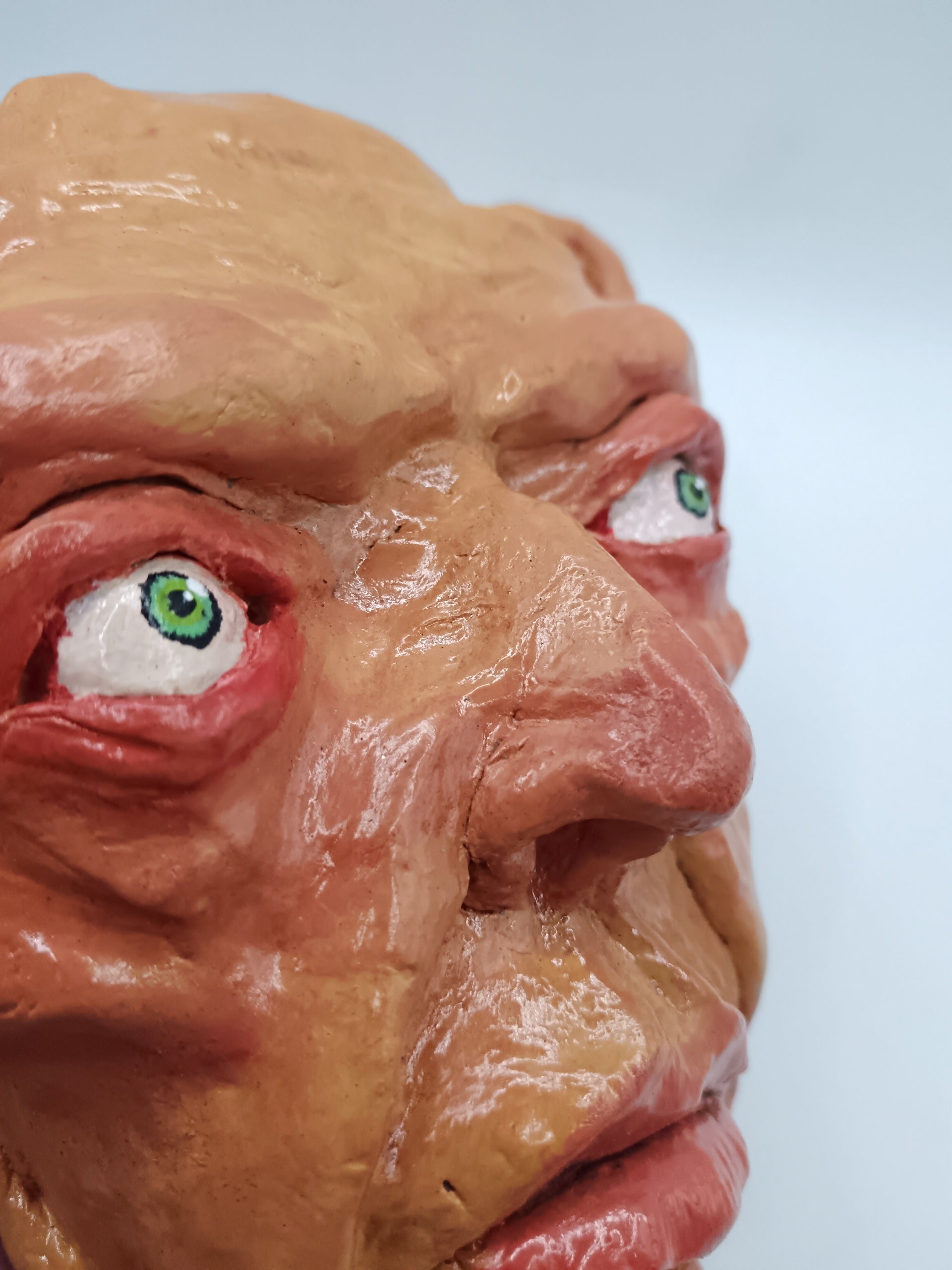 creepy yellow bear, hand sculpted clay sculpture mask close-up