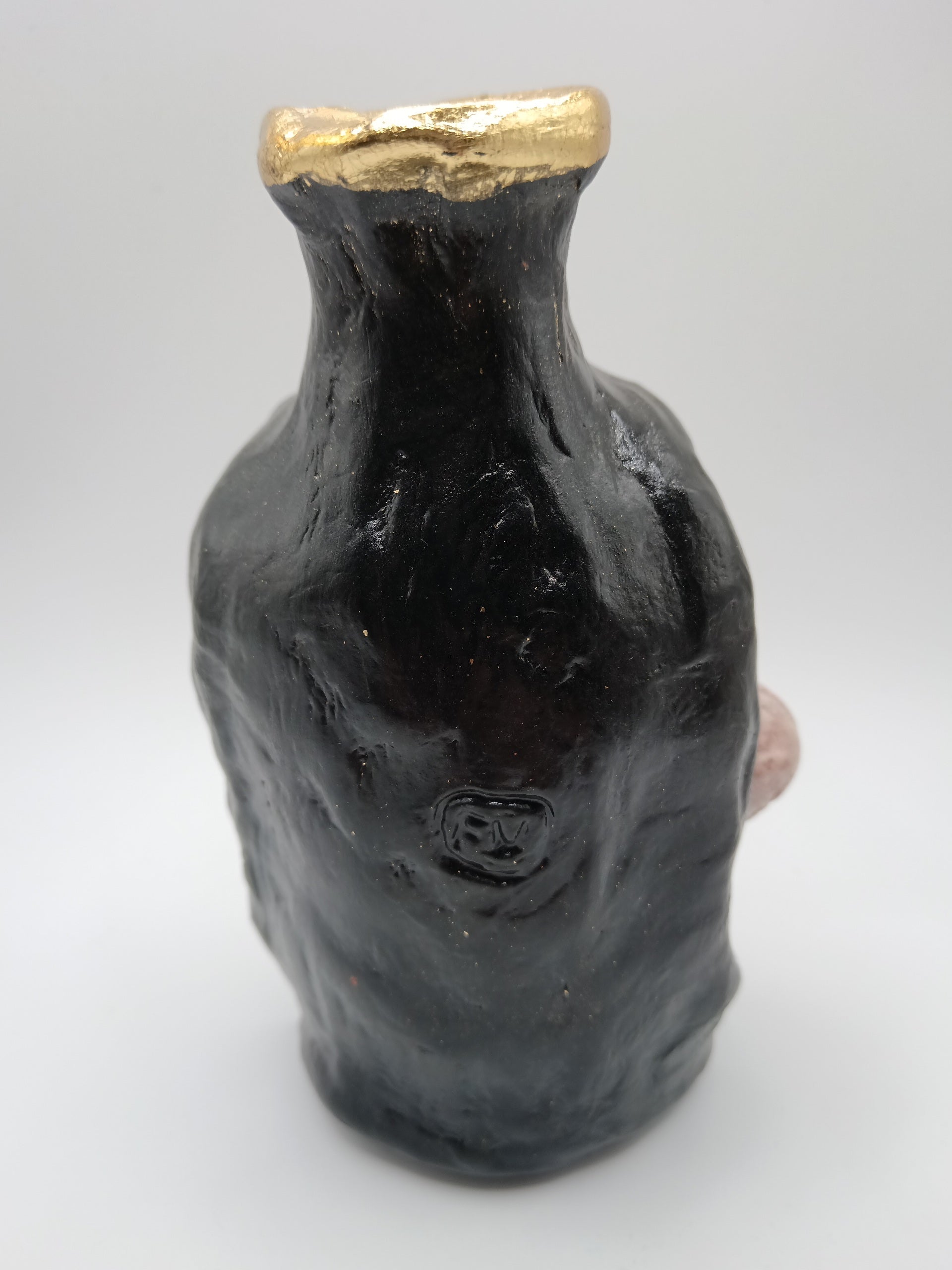 hand sculpted Skull vase back view