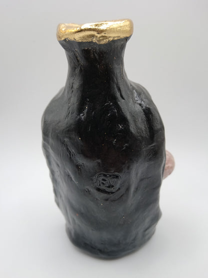 hand sculpted Skull vase back view