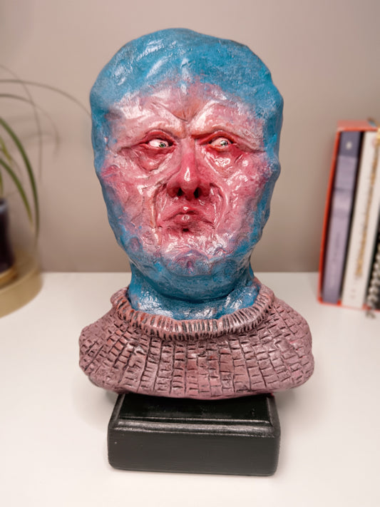 handmade clay alien sculpture, home setting