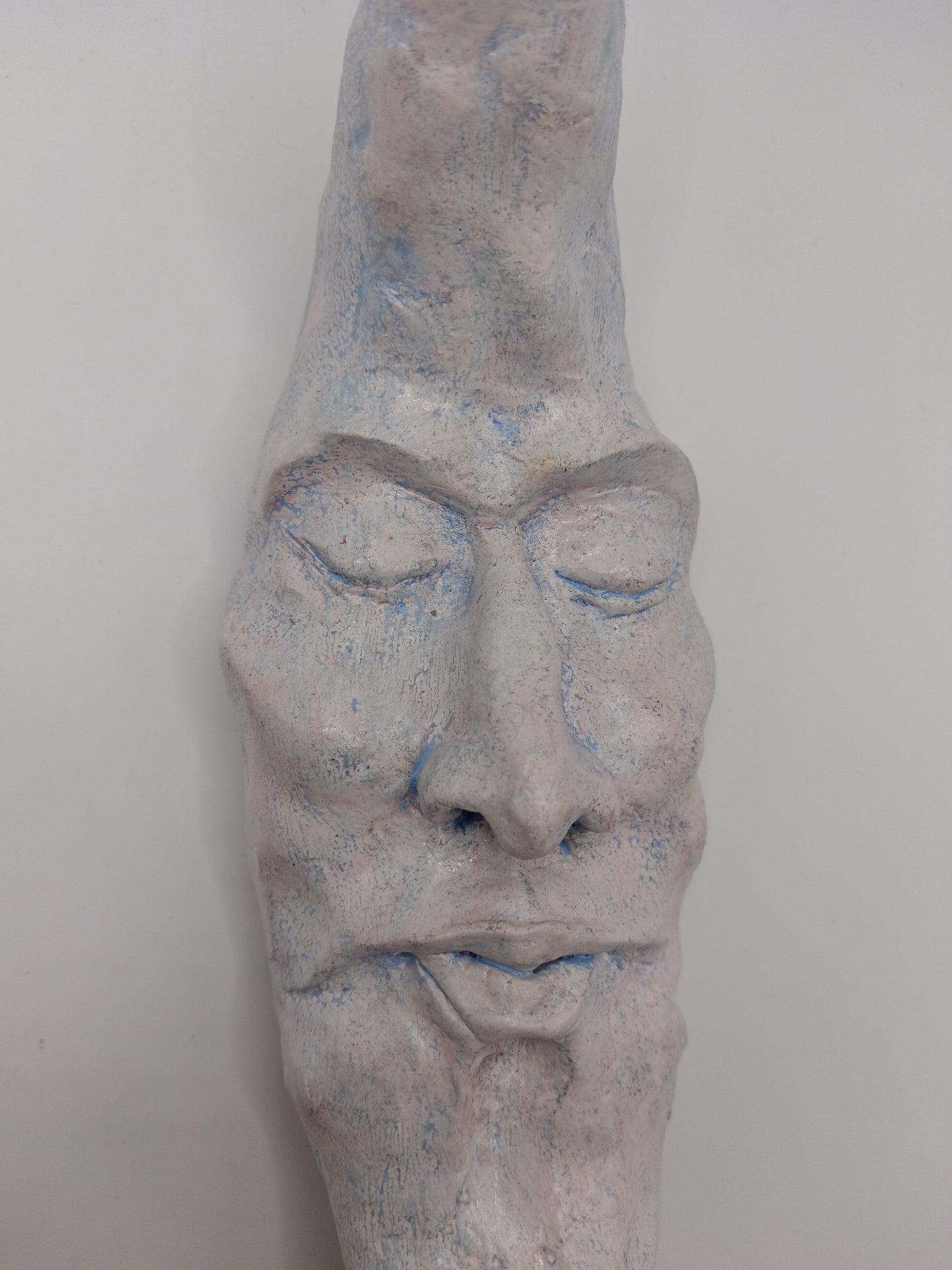 handmade sleeping moon sculpture close up