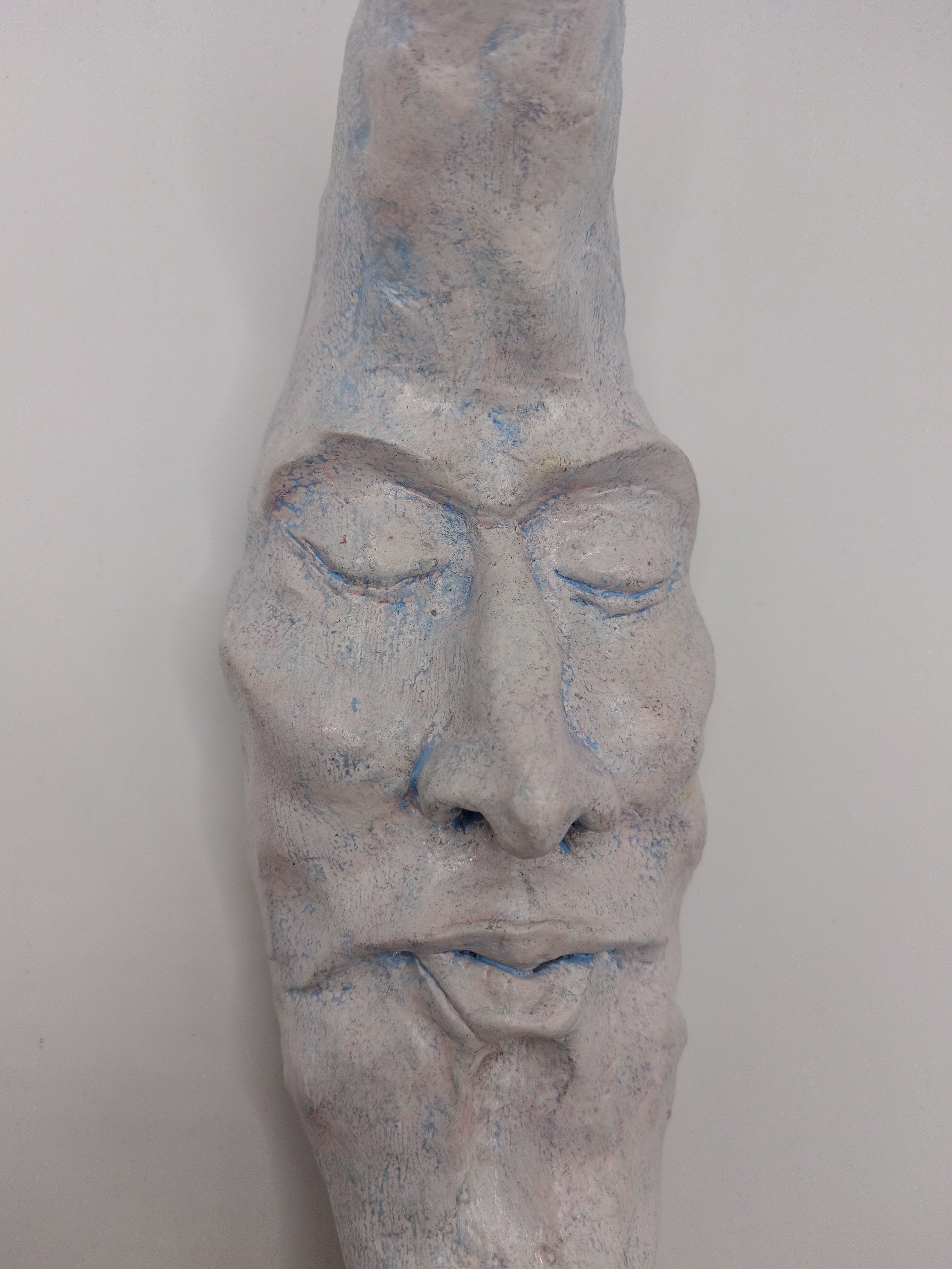 handmade sleeping moon sculpture close up