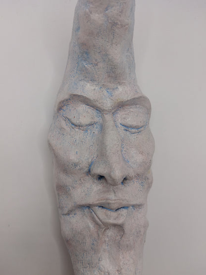 handmade sleeping moon sculpture close up