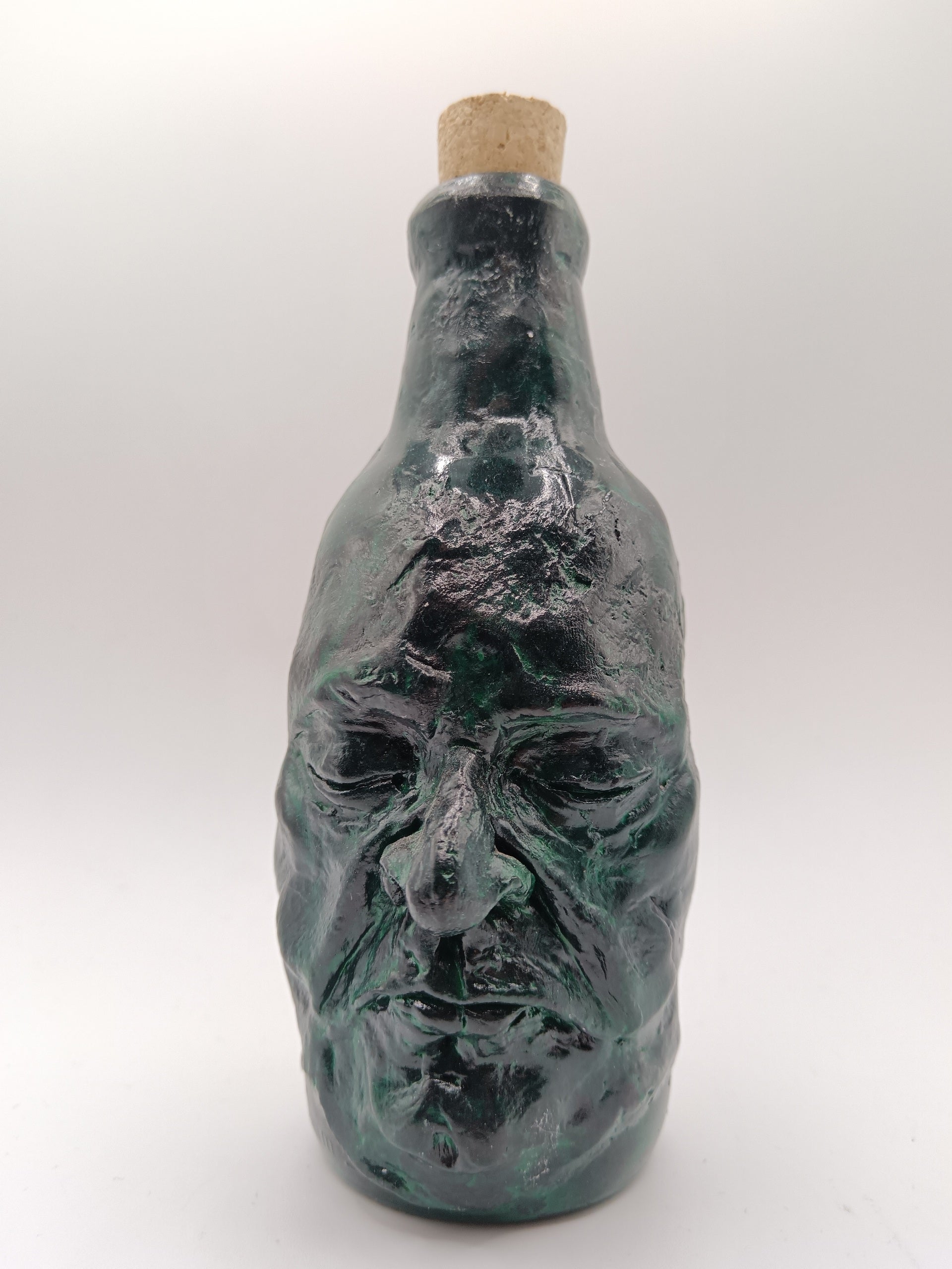 dark green handmade portrait bottle vase