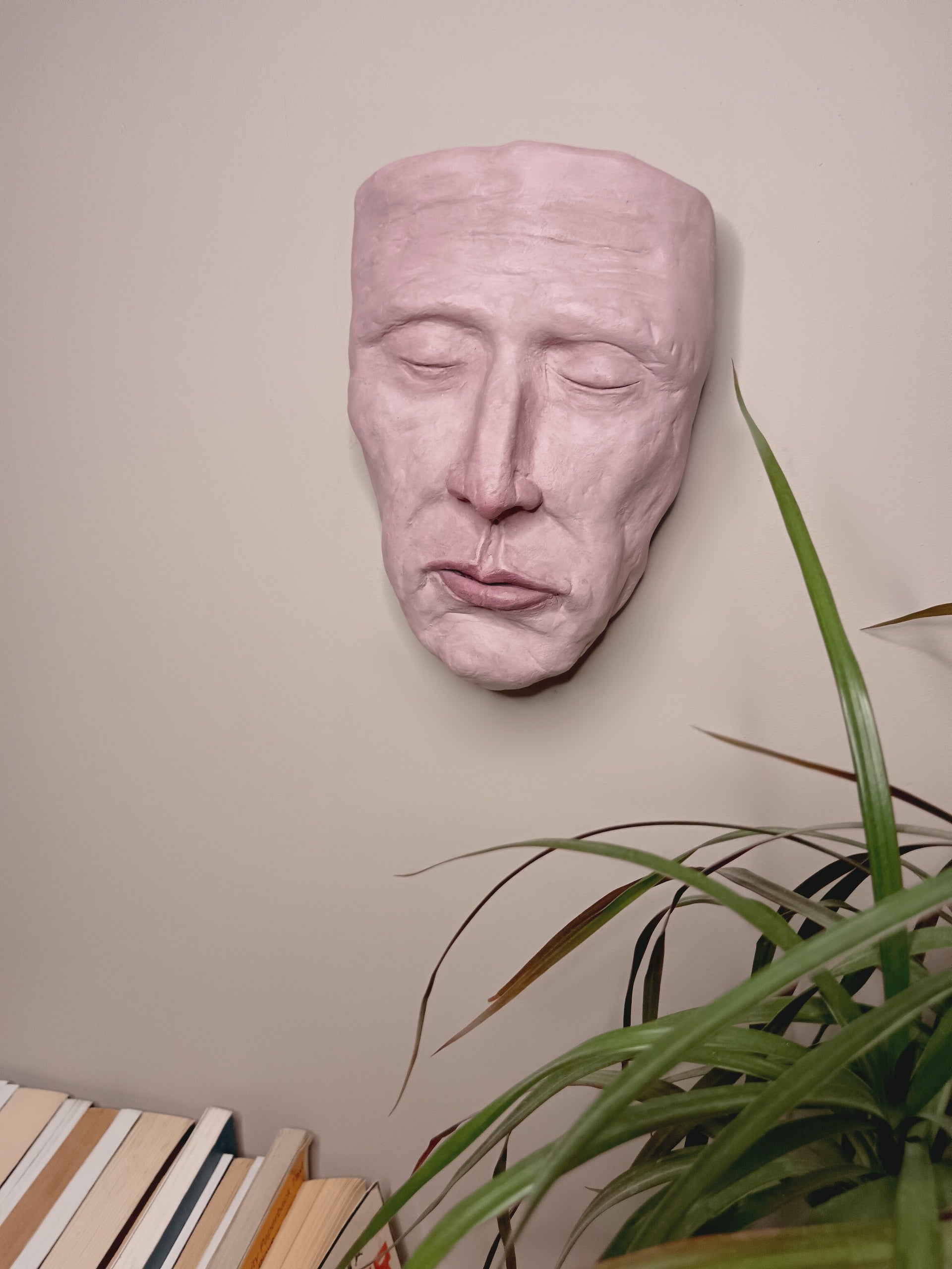  hand sculpted death mask sculpture wall hanging, home setting 