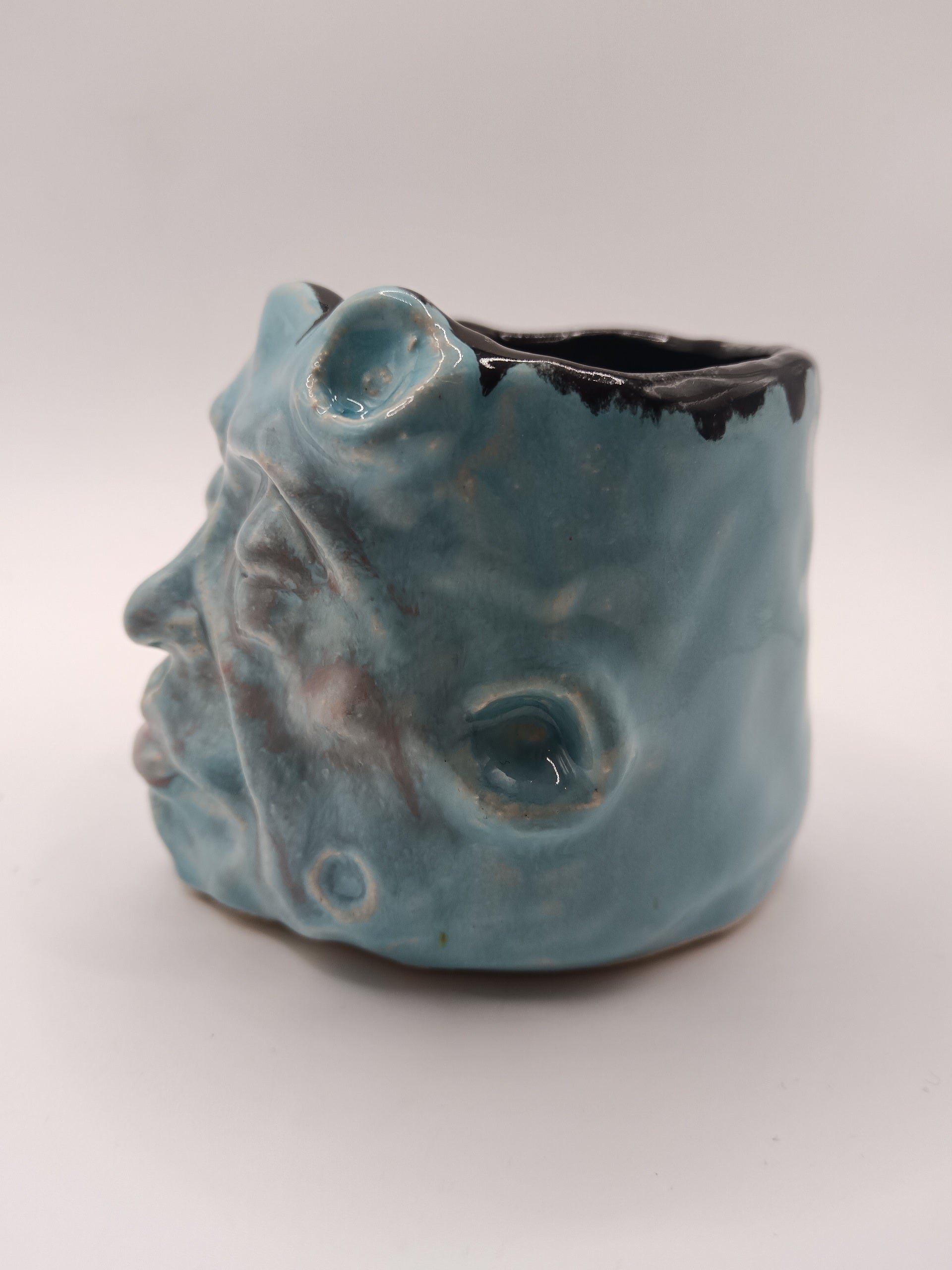 handmade ceramic moon face tumbler
