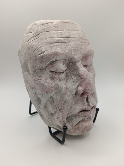 white Death mask Hand sculpted clay sculpture with stand front right