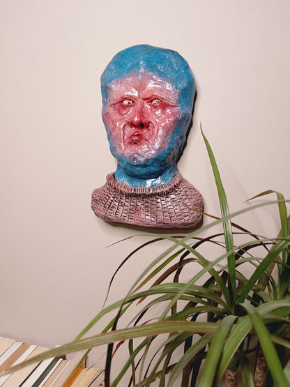 handmade clay alien sculpture, home setting wall mounted
