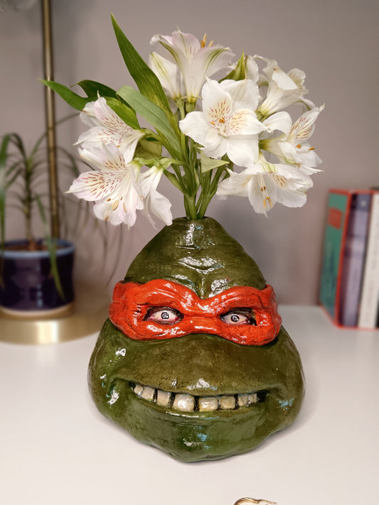 teenage mutant ninja turtles sculpture vase with flowers