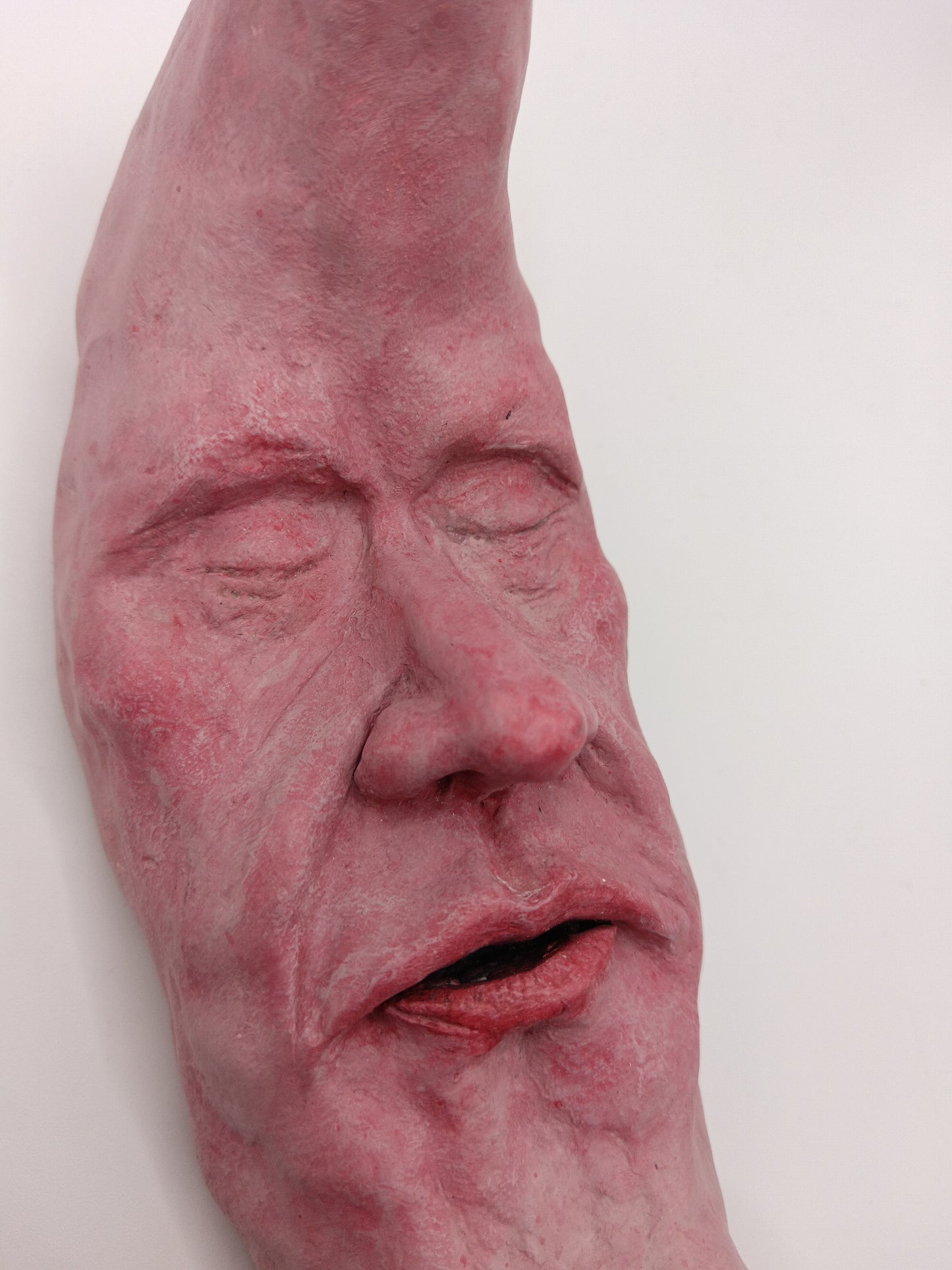 pink crescent moon sculpture close-up