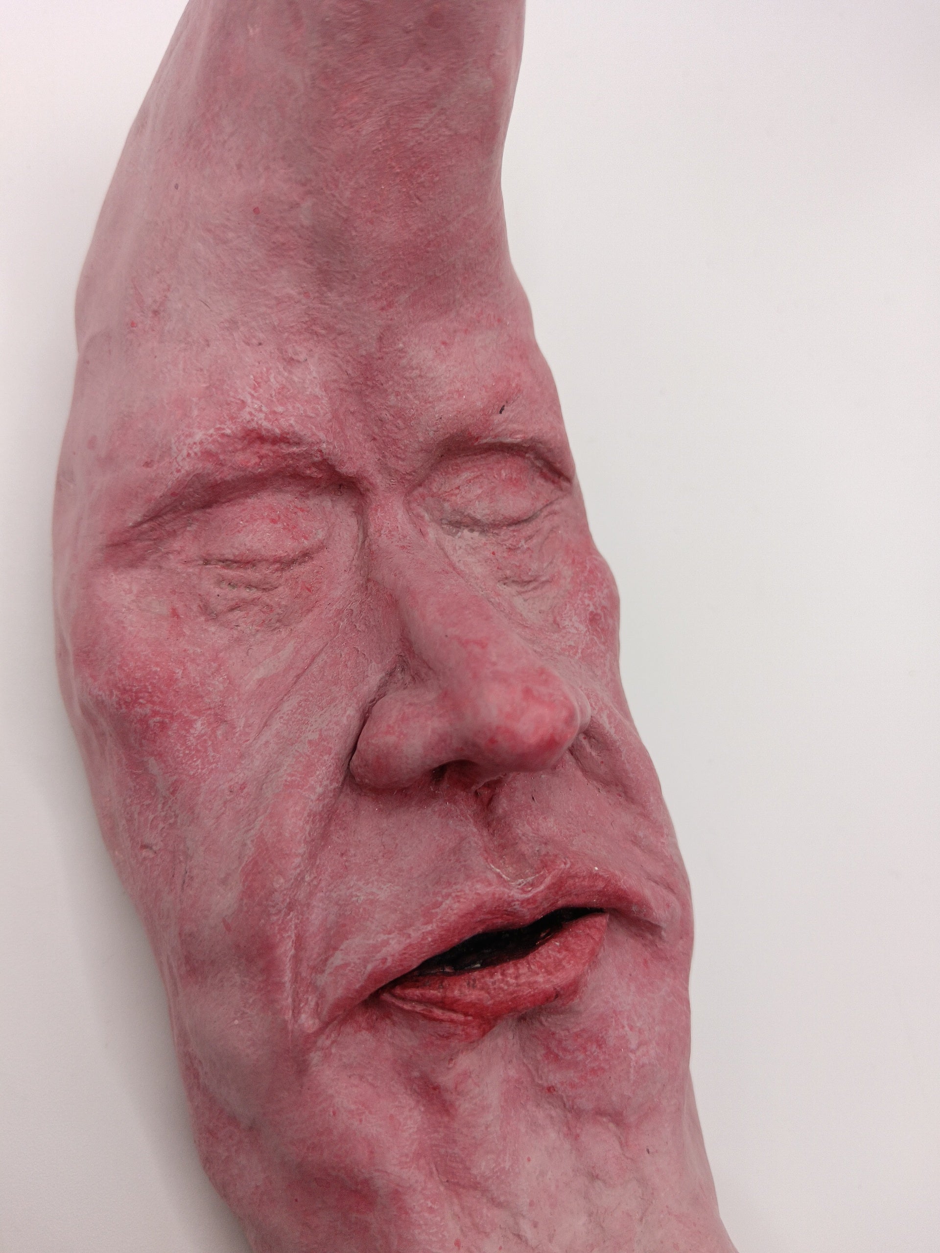 pink crescent moon sculpture close-up