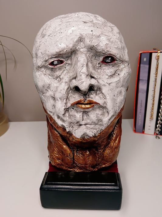 Handmade white and gold clay sculpture